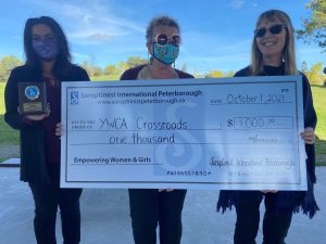 YWCA's Ria Nicholson and Kim Dolan accept $1,000 donation from Soroptimist International Peterborough
